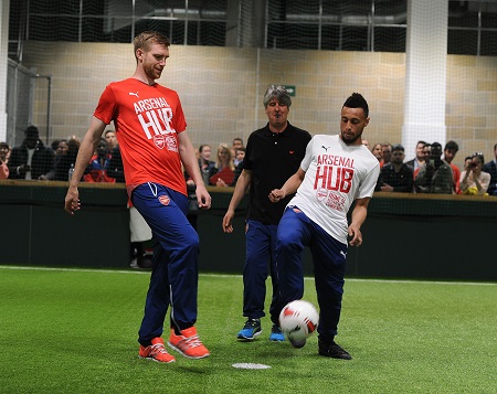 LONDON, ENGLAND - MAY 08:  (L-R) Arsenal's Per Mertesacker and Francis Coquelin kick off the first official match at the Arsenal Community Hub at Emirates Stadium on May 8, 2015 in London, England.  (Photo by Stuart MacFarlane/Arsenal FC via Getty Images) *** Local Caption *** Francis Coquelin;Per Mertesacker